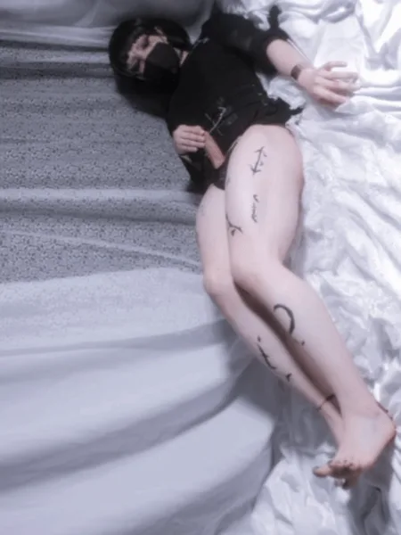 Beneath her skin lie only holy scars.